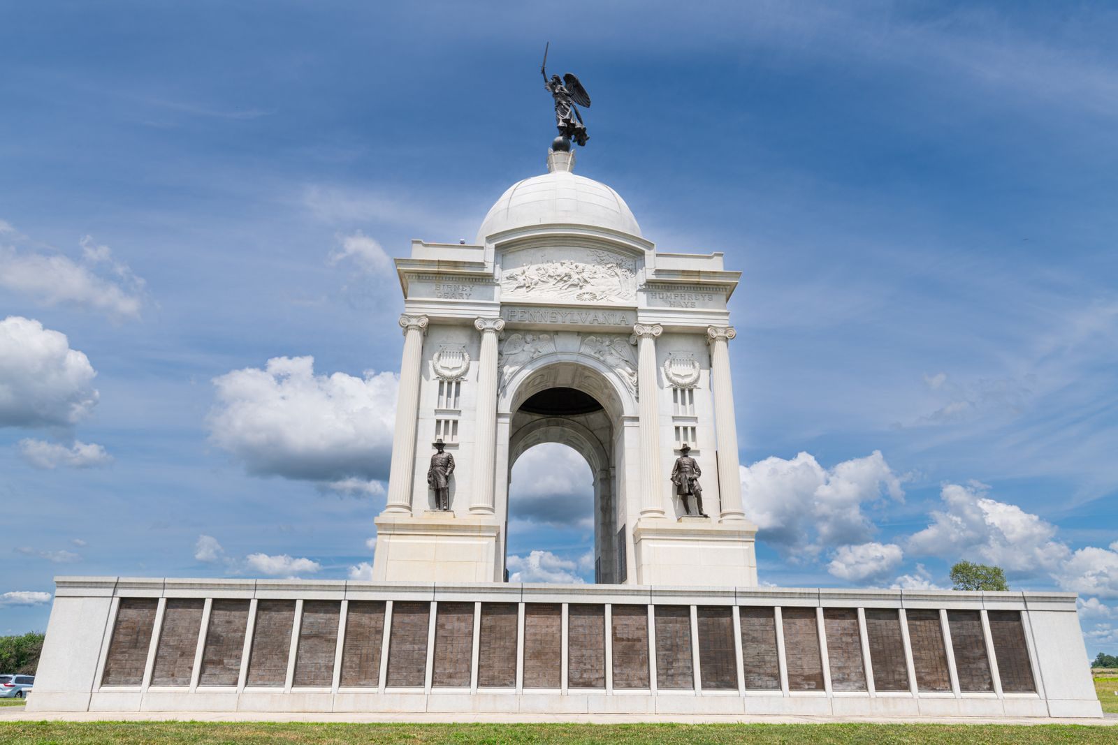 The domed Pennsylvania State Memorial at Gettysburg National Military Park under a blue sky